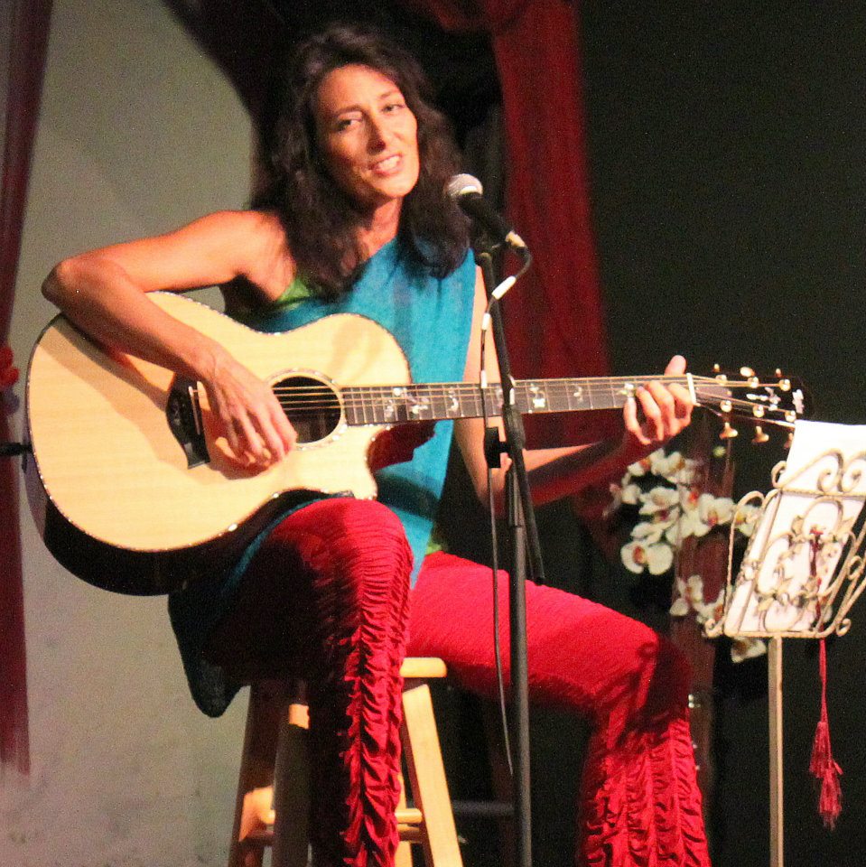 Cheri playing guitar 2012
